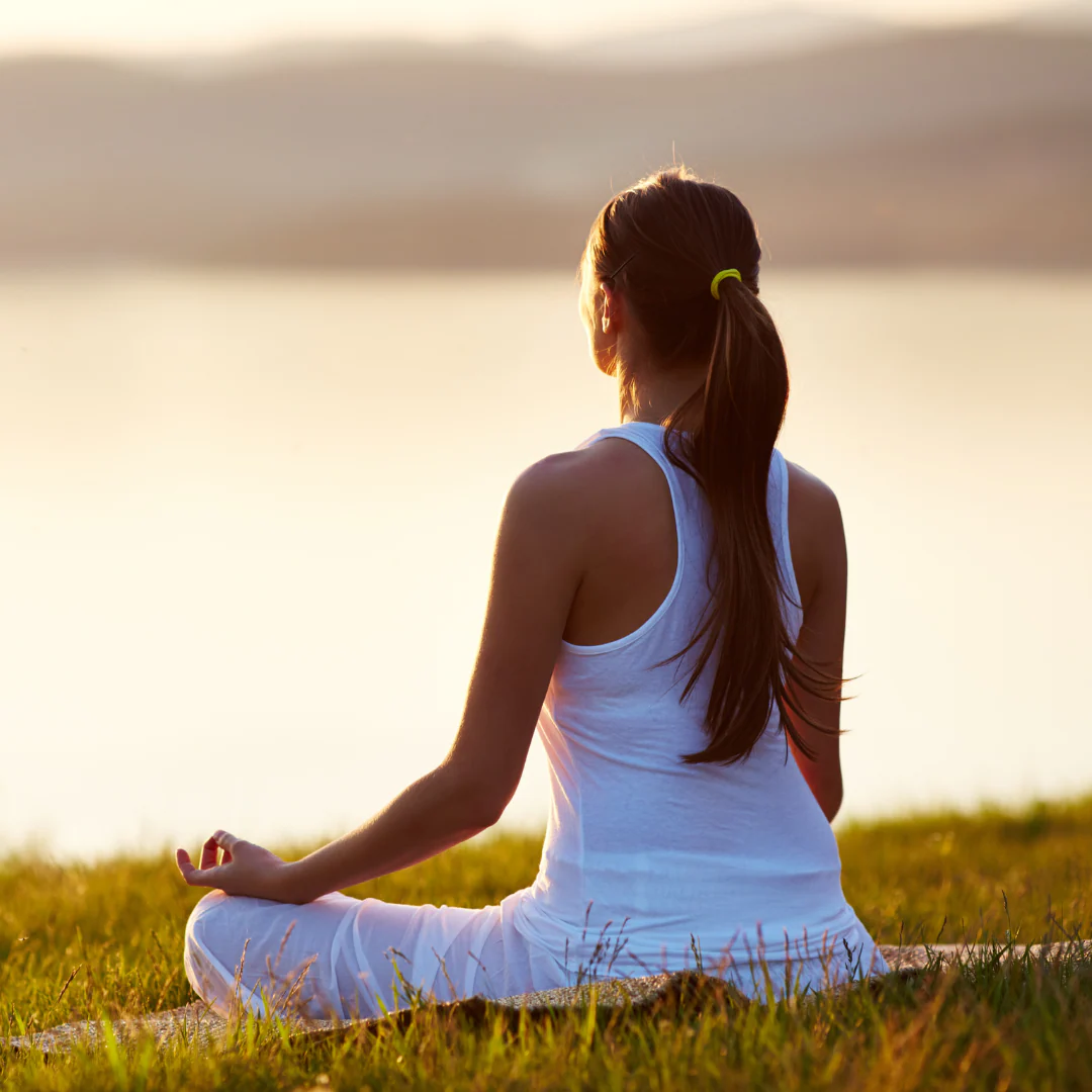 Person practicing mindful movement in a serene environment